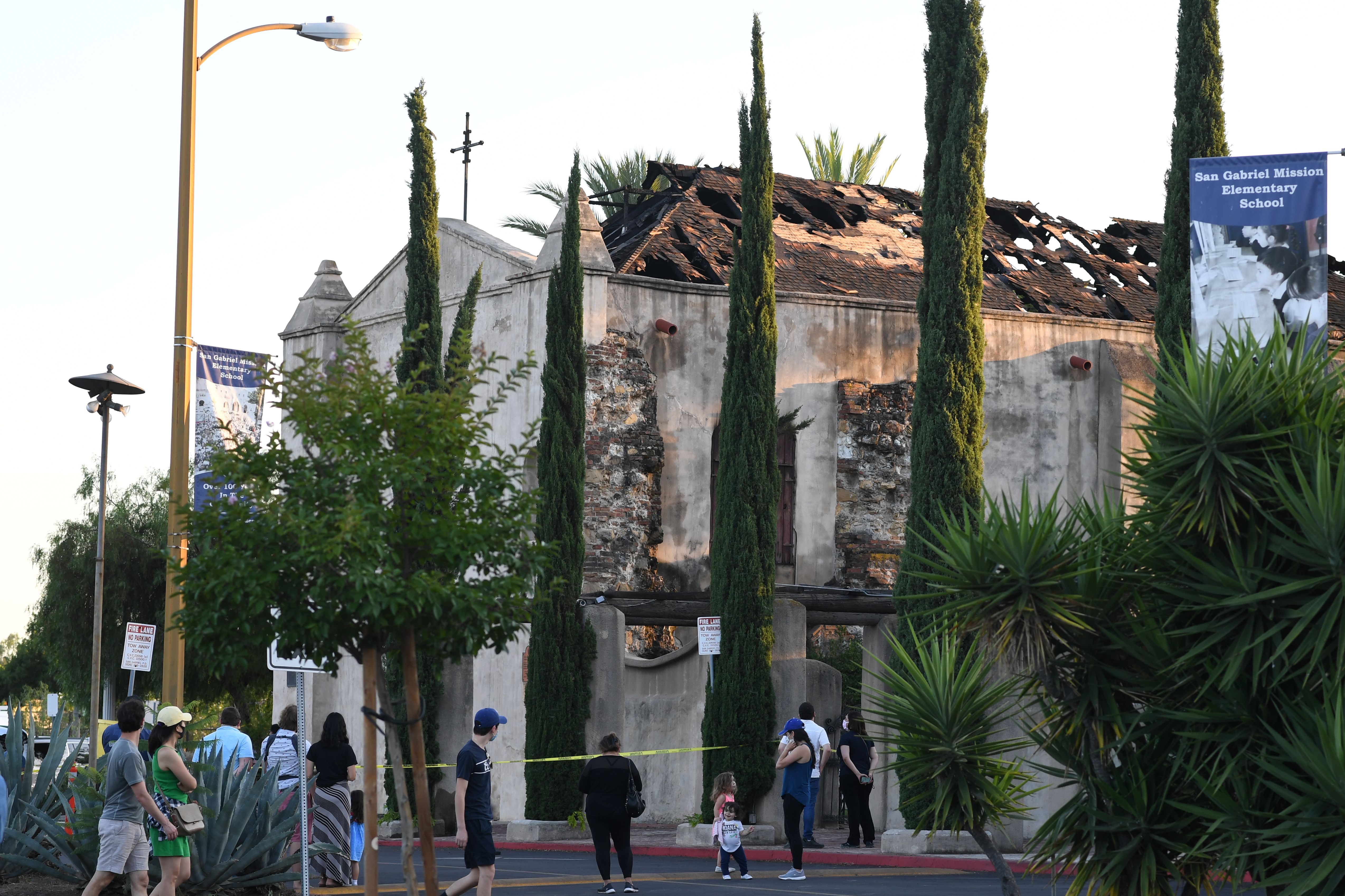 The damaged roof of the San Gabriel Mission is seen after a fire broke out early on July 11, 2020, in San Gabriel. (ROBYN BECK/AFP via Getty Images)