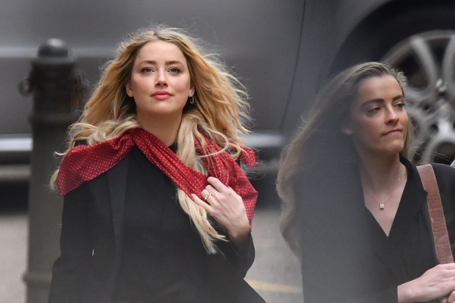 Actress Amber Heard arrives on day eight of the libel trial by her former husband actor Johnny Depp against News Group Newspapers (NGN), at the High Court in London, on July 16, 2020. (JUSTIN TALLIS/AFP via Getty Images)