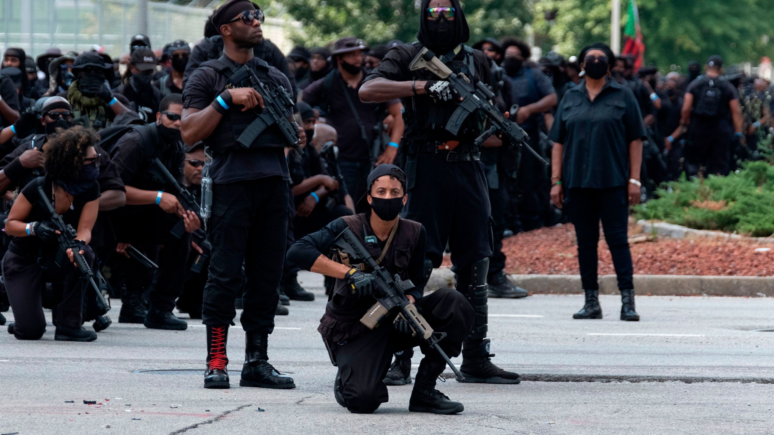 Members of the "Not F---ing Around Coalition" (NFAC), an all black militia, march during a rally to protest the killing of Breonna Taylor, in Louisville, Kentucky on July 25, 2020. (JEFF DEAN/AFP via Getty Images)