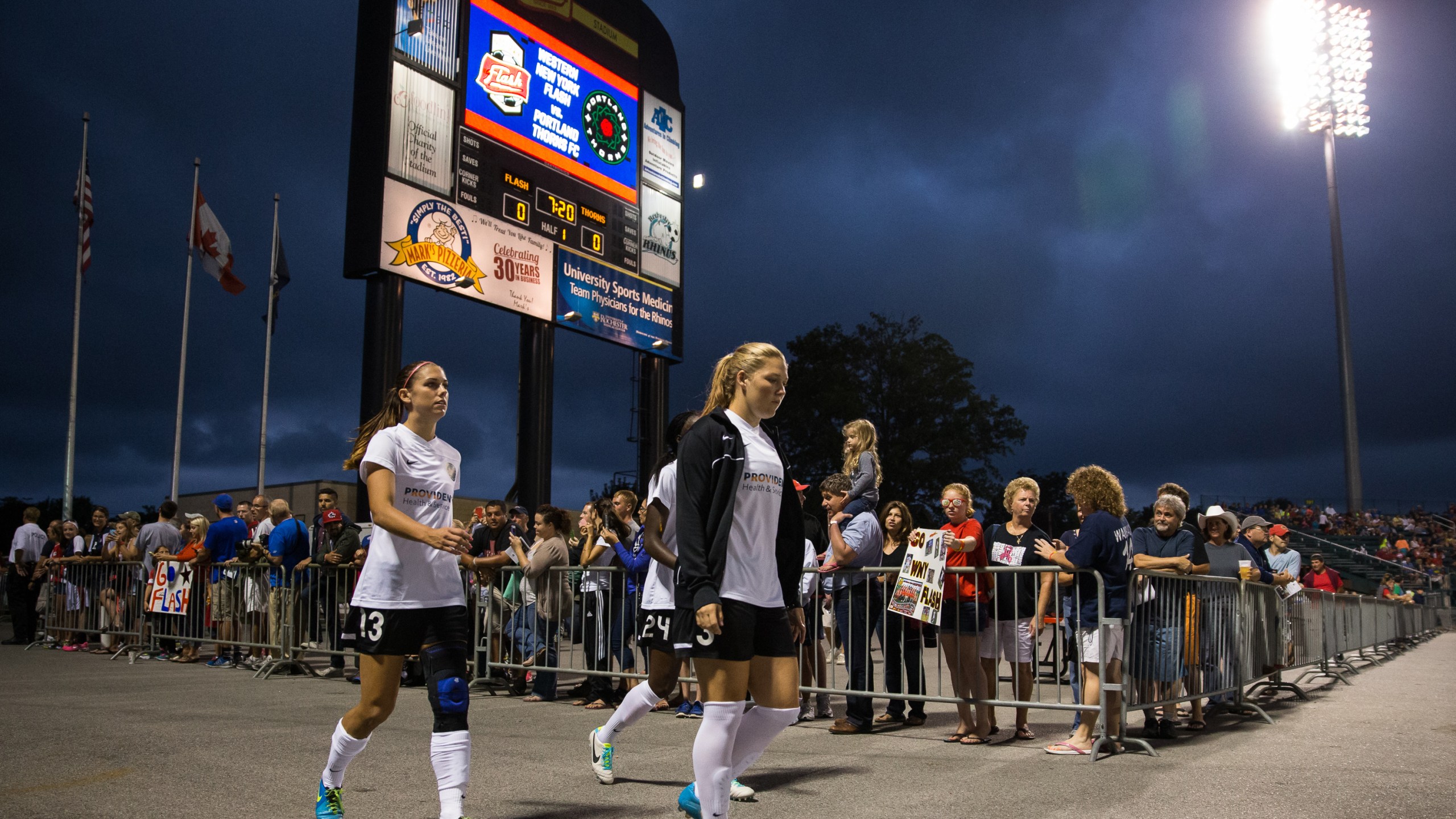 Alex Morgan, left, of Portland Thorns FC enters the field as a non-starting player at the National Women's Soccer League Championship against Western New York Flash at Sahlen's Stadium on Aug. 31, 2013 in Rochester, New York. (Brett Carlsen/Getty Images)