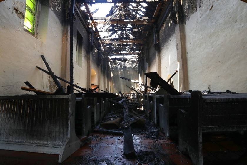 A fire burned most of San Gabriel Mission’s roof and interior in July 2020. Here, some of the destroyed building is seen in the days after. (Carolyn Cole / Los Angeles Times)