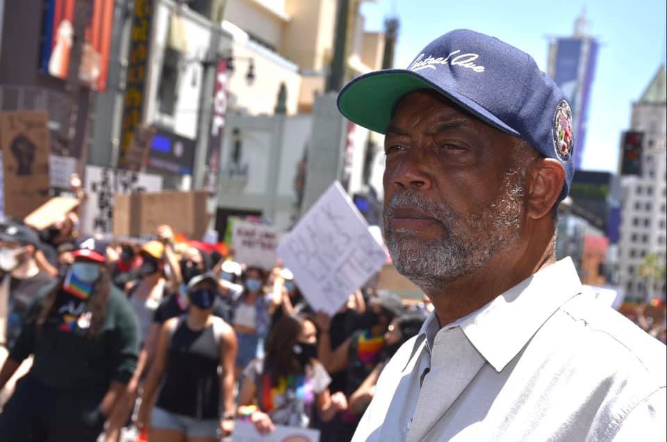 Curren Price appears with Black Lives Matter protesters in a photo posted on his Facebook page on July 1, 2020.