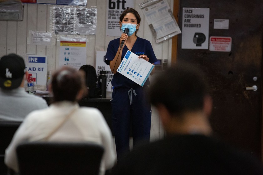 Los Angeles Apparel holds a health and safety training session for its employees on July 15, 2020, after the South L.A. garment factory was shut down by county officials due to more than 300 coronavirus cases and four worker deaths. (Jason Armond / Los Angeles Times)