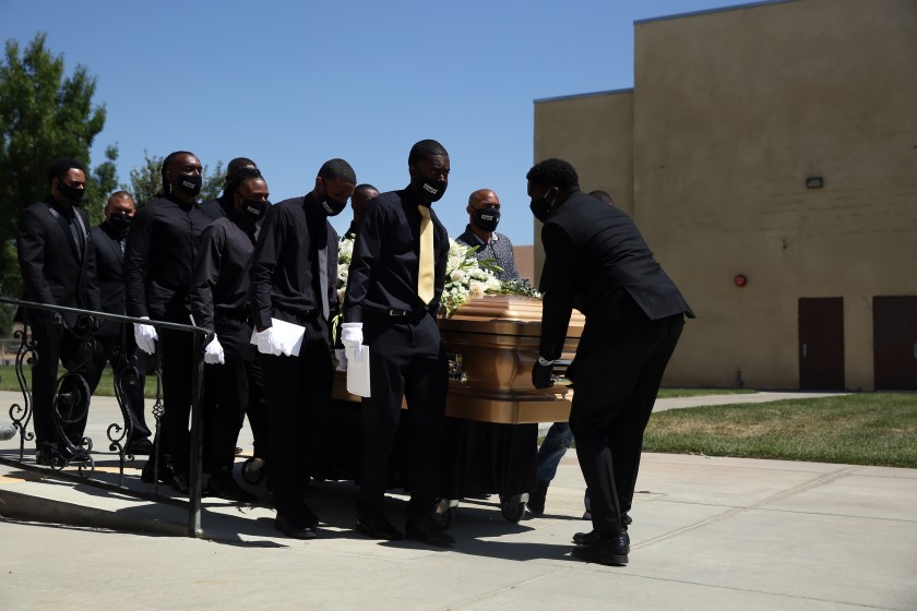 Pallbearers carry Robert Fuller’s casket to the hearse at Living Stone Cathedral of Worship on Tuesday, June 30, 2020 in Little Rock, Calif. (Dania Maxwell / Los Angeles Times)