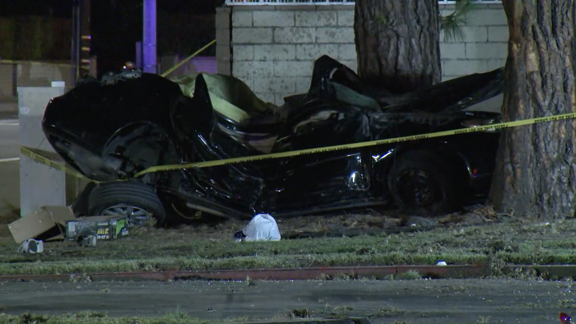 A stolen vehicle is seen after a crash during a pursuit in Garden Grove on July 30, 2020, killing two people and injuring a third. (KTLA)