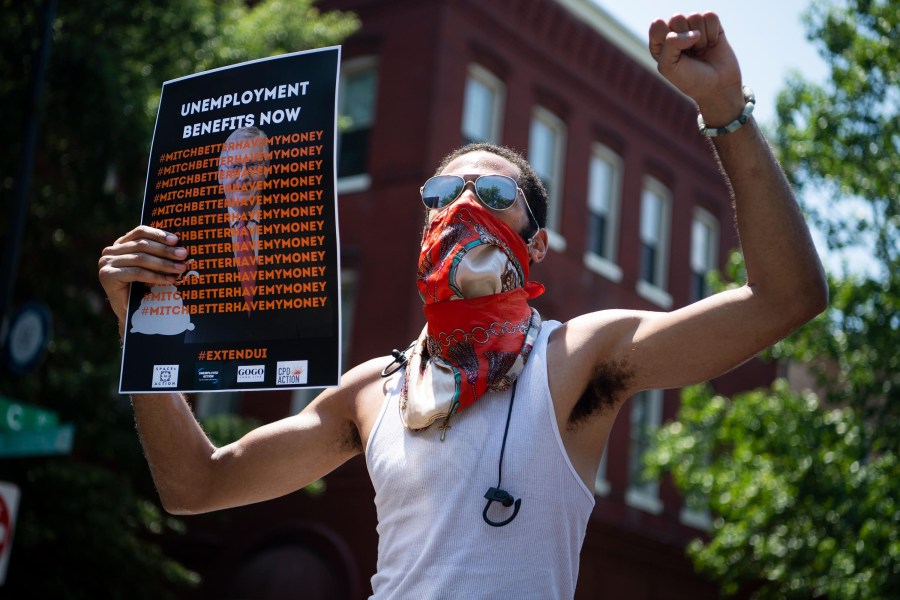 Demonstrators rally near the Capitol Hill residence of Senate Majority Leader Mitch McConnell to call for the extension of unemployment benefits on July 22, 2020. (Tom Williams/CQ-Roll Call, Inc via Getty Images via CNN)