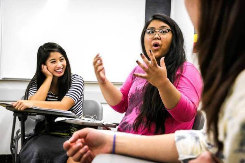 Kyla Artigo, 20, center, speaks during an Asian American studies class at Cal State Long Beach in 2013. (Ricardo DeAratanha / Los Angeles Times)