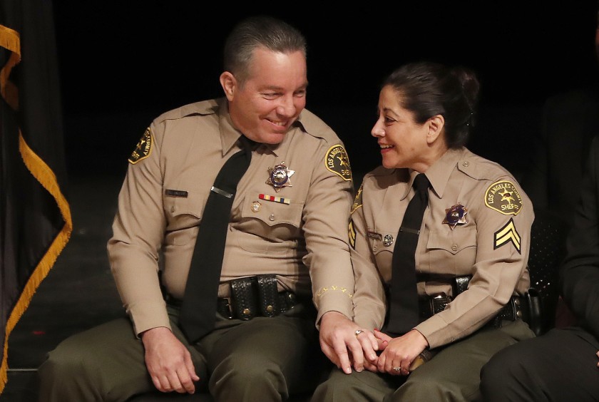 Sheriff Alex Villanueva, with his wife, Vivian, at the ceremony for his swearing in in 2018.(Mel Melcon / Los Angeles Times)