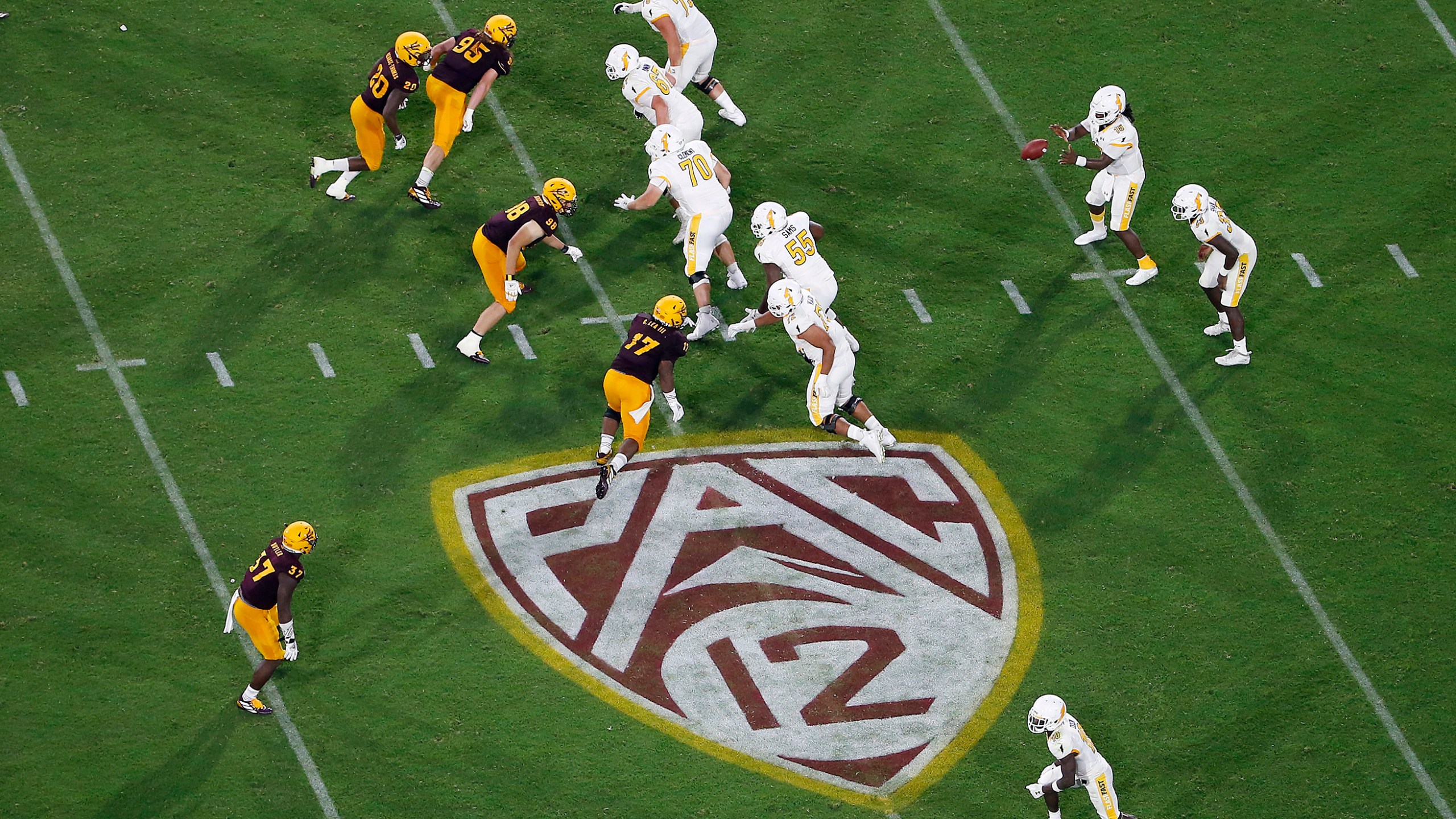 This Thursday, Aug. 29, 2019, file photo, shows the Pac-12 logo during the second half of an NCAA college football game between Arizona State and Kent State, in Tempe, Arizona. (AP Photo/Ralph Freso, File)