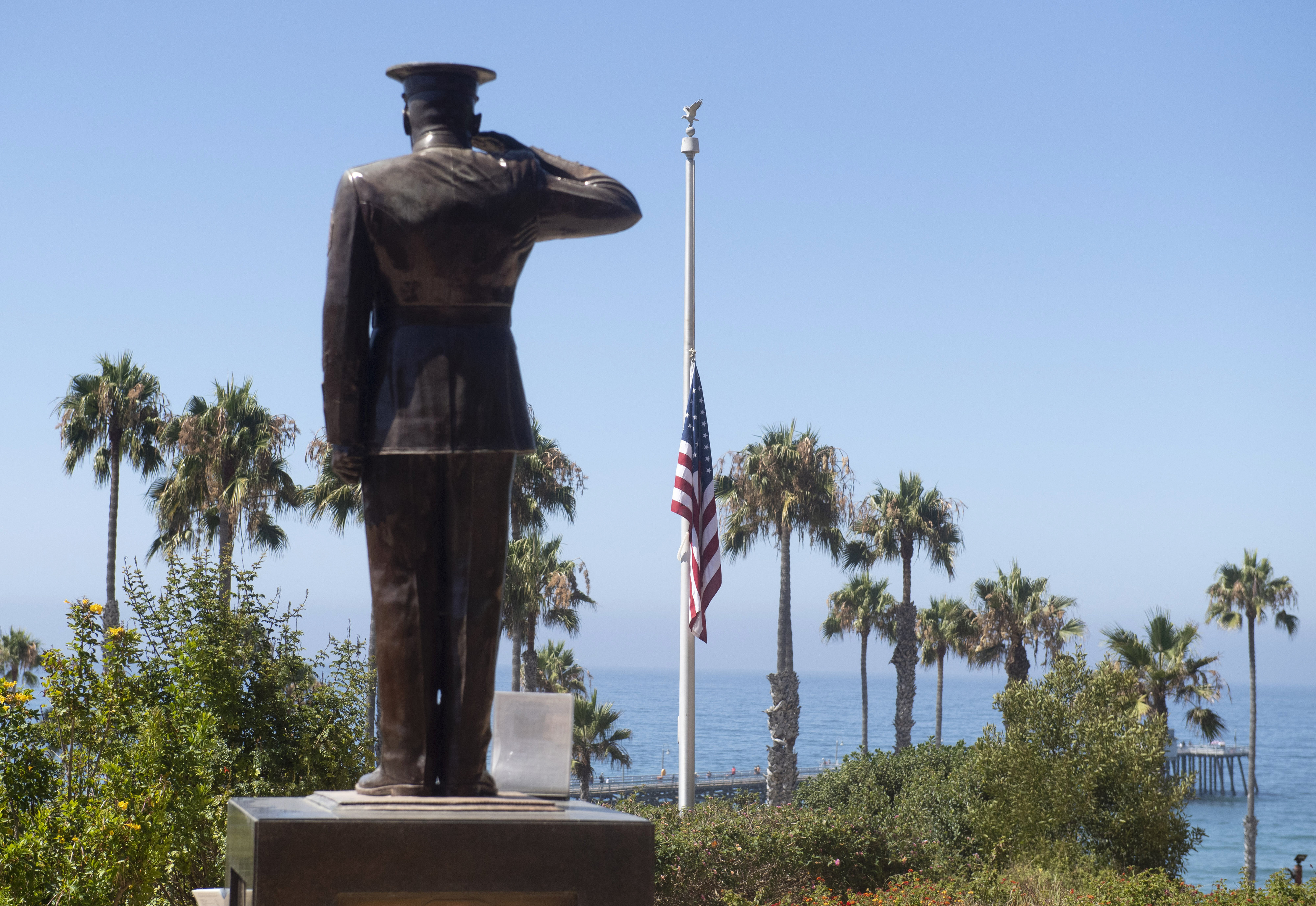 (The U.S. flag was lowered to half-staff at Park Semper Fi in San Clemente on July 31, 2020. (Paul Bersebach/The Orange County Register via AP, file)