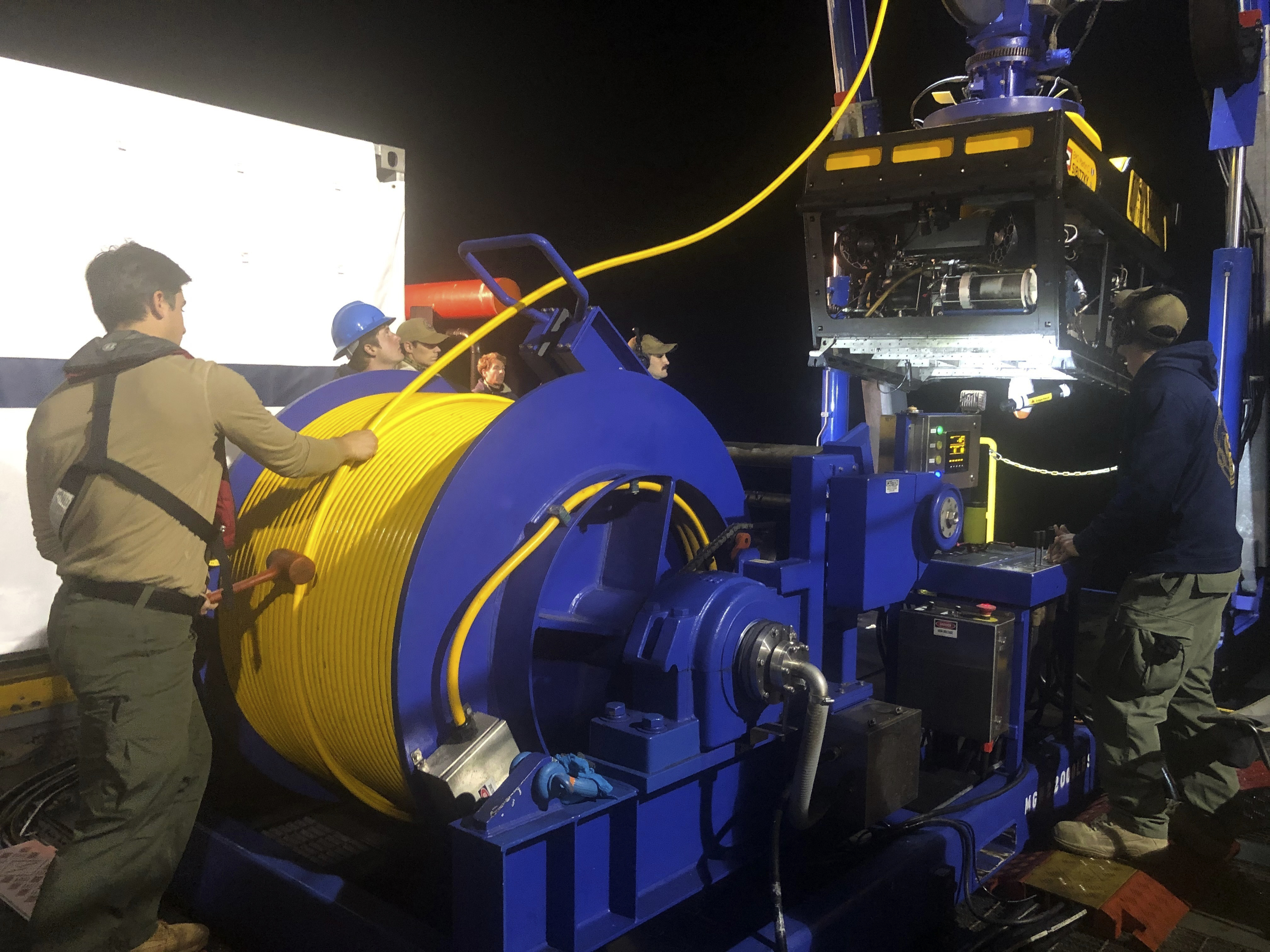 In this photo provided by the U.S. Navy, Undersea Rescue Command deploys the Sibitzky Remotely Operated Vehicle (ROV) from the deck of the Military Sealift Command-chartered merchant vessel HOS Dominator off the coast of Southern California on Sunday, Aug. 2, 2020. Officials with the 15th Marine Expeditionary Unit (MEU), I Marine Expeditionary Force (MEF), and the Makin Island Amphibious Ready Group (ARG) positively identified on Aug. 3, 2020 the location of the amphibious assault vehicle that sunk off the coast of San Clemente Island on July 30,2020. The U.S. Navy's Undersea Rescue Command confirmed that human remains have also been identified using their underwater remotely-operated video systems from the merchant vessel. (Lt. Curtis Khol/U.S. Navy via AP)