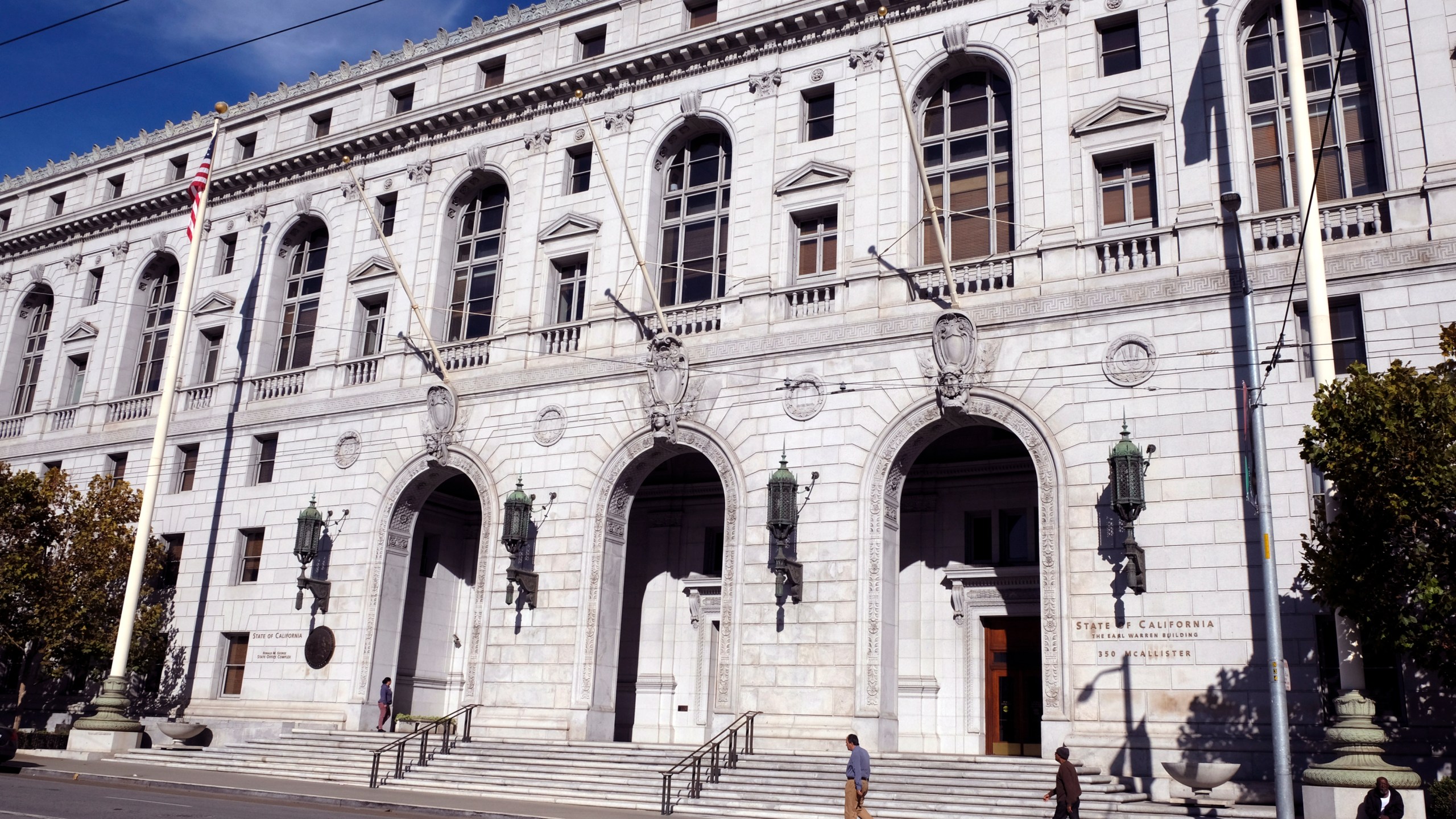 People walk past the Earl Warren Building that houses the California Supreme Court in San Francisco on Jan. 2, 2019. (Eric Risberg/Associated Press)