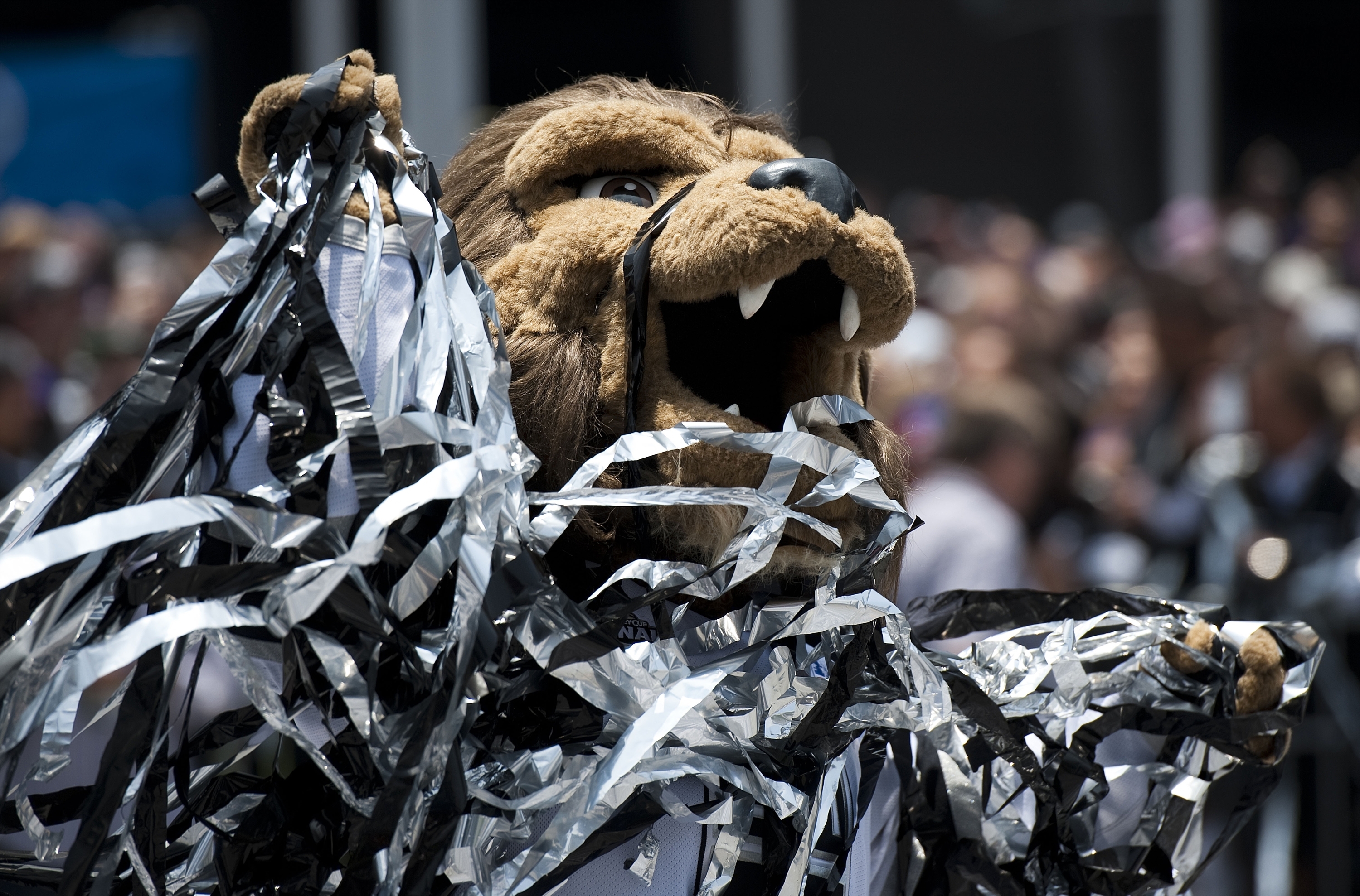 This June 14, 2012 file photo shows Bailey, the Los Angeles Kings' mascot covered in confetti at the end of a parade celebrating the teams' winning of the Stanley Cup in the NHL hockey championship at Staples Center, Los Angeles. (AP Photo/Grant Hindsley, File)