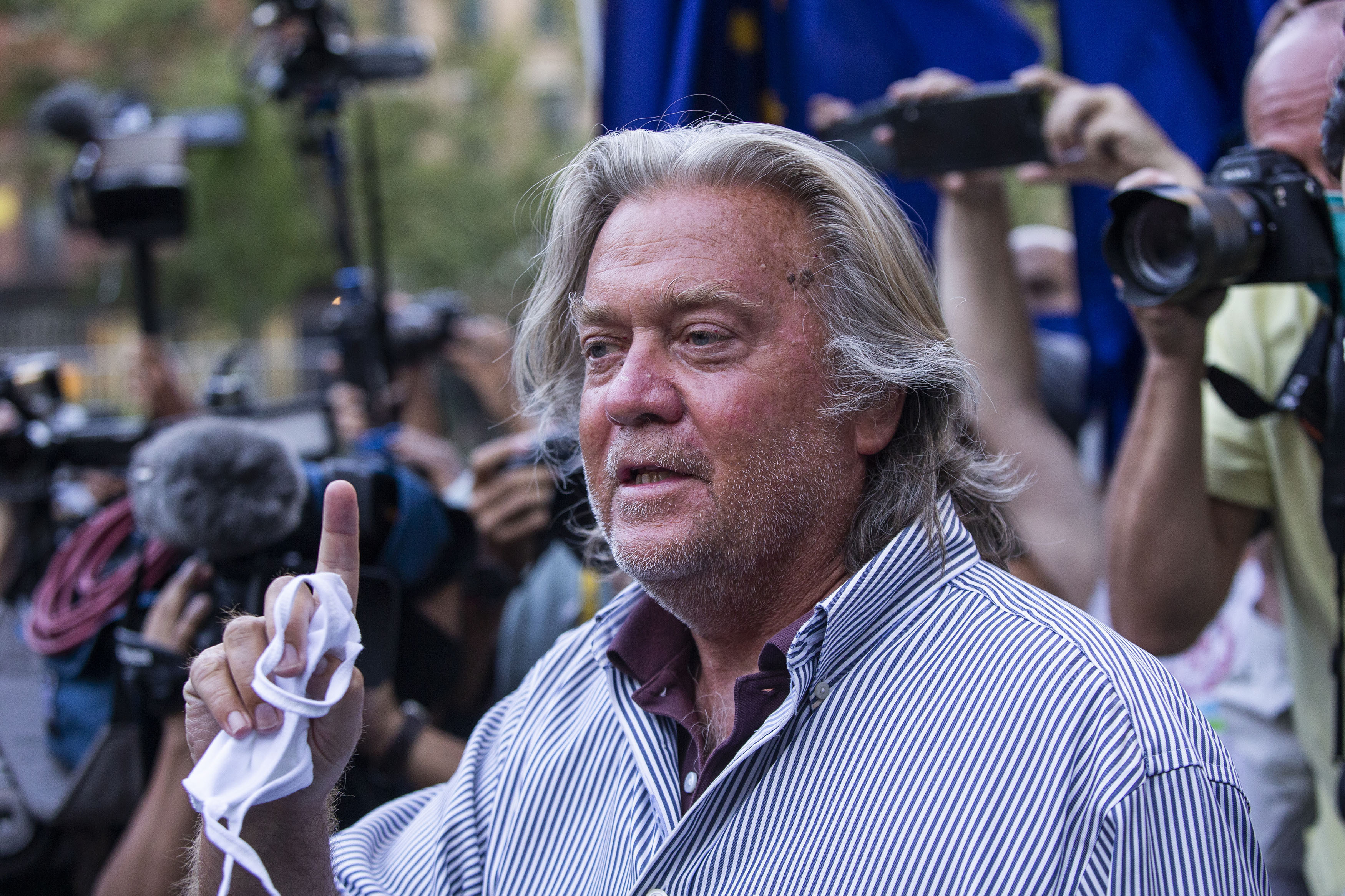 President Donald Trump's former chief strategist Steve Bannon speaks with reporters after pleading not guilty to charges that he ripped off donors to an online fundraising scheme to build a southern border wall Aug. 20, 2020, in New York. (Eduardo Munoz Alvarez/Associated Press)