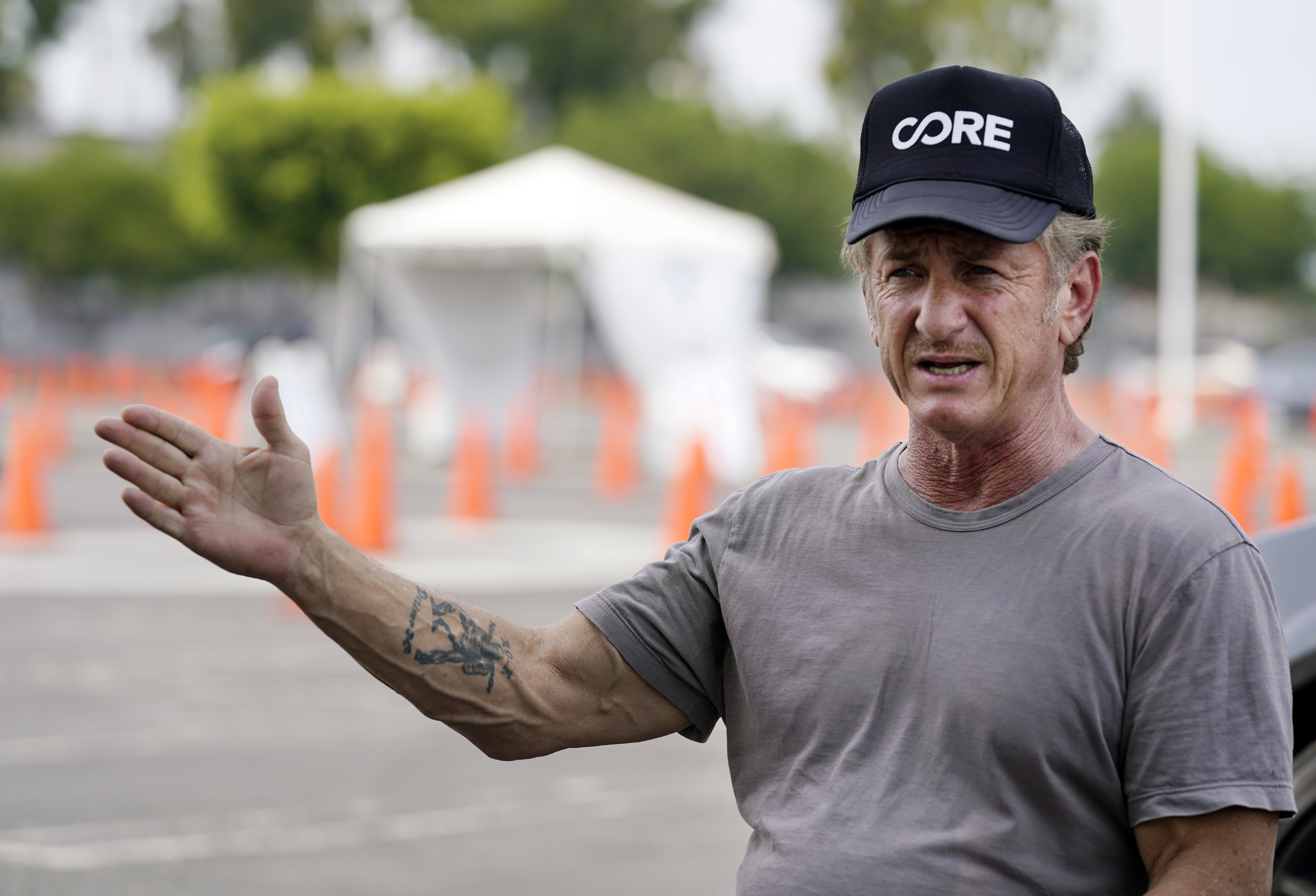 Actor Sean Penn is interviewed at a CORE coronavirus testing site at Crenshaw Christian Center on Aug. 21, 2020, in Los Angeles. (AP Photo/Chris Pizzello)