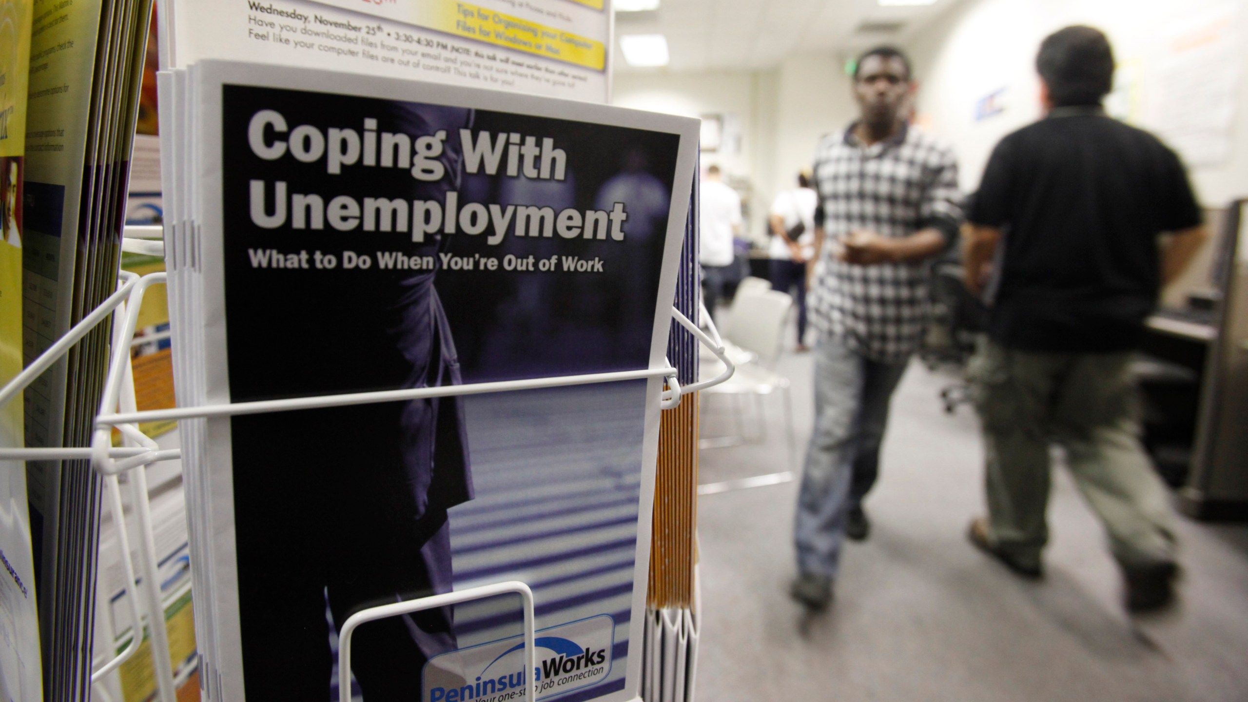 In this July 20, 2010 file photo, people arrive to seek employment opportunities at a JobTrain office in Menlo Park. (AP Photo/Paul Sakuma, File)