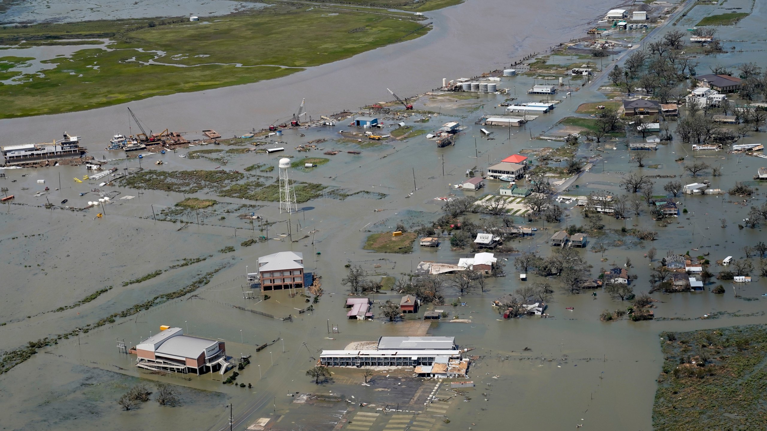 Buildings and homes are flooded in the aftermath of Hurricane Laura Thursday, Aug. 27, 2020, in Cameron, La. (AP Photo/David J. Phillip)