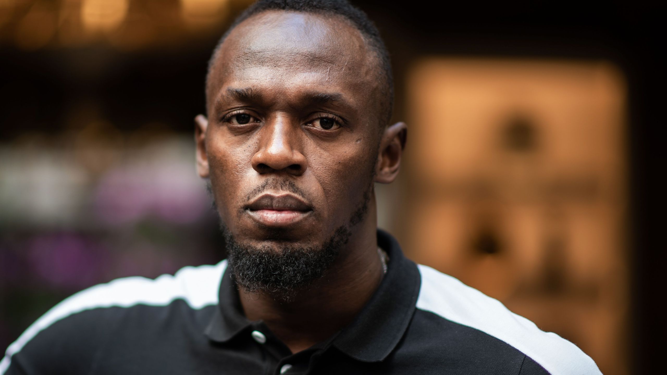 Jamaican Olympic sprinter Usain Bolt poses during a photo session as he launches a new brand of electric scooters named "Bolt" in Paris, on May 15, 2019. (MARTIN BUREAU/AFP via Getty Images)