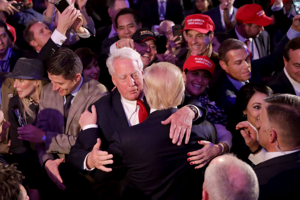 Donald Trump hugs his brother Robert Trump after delivering his acceptance speech at the New York Hilton Midtown in the early morning hours of Nov. 9, 2016, in New York City. (Chip Somodevilla/Getty Images)