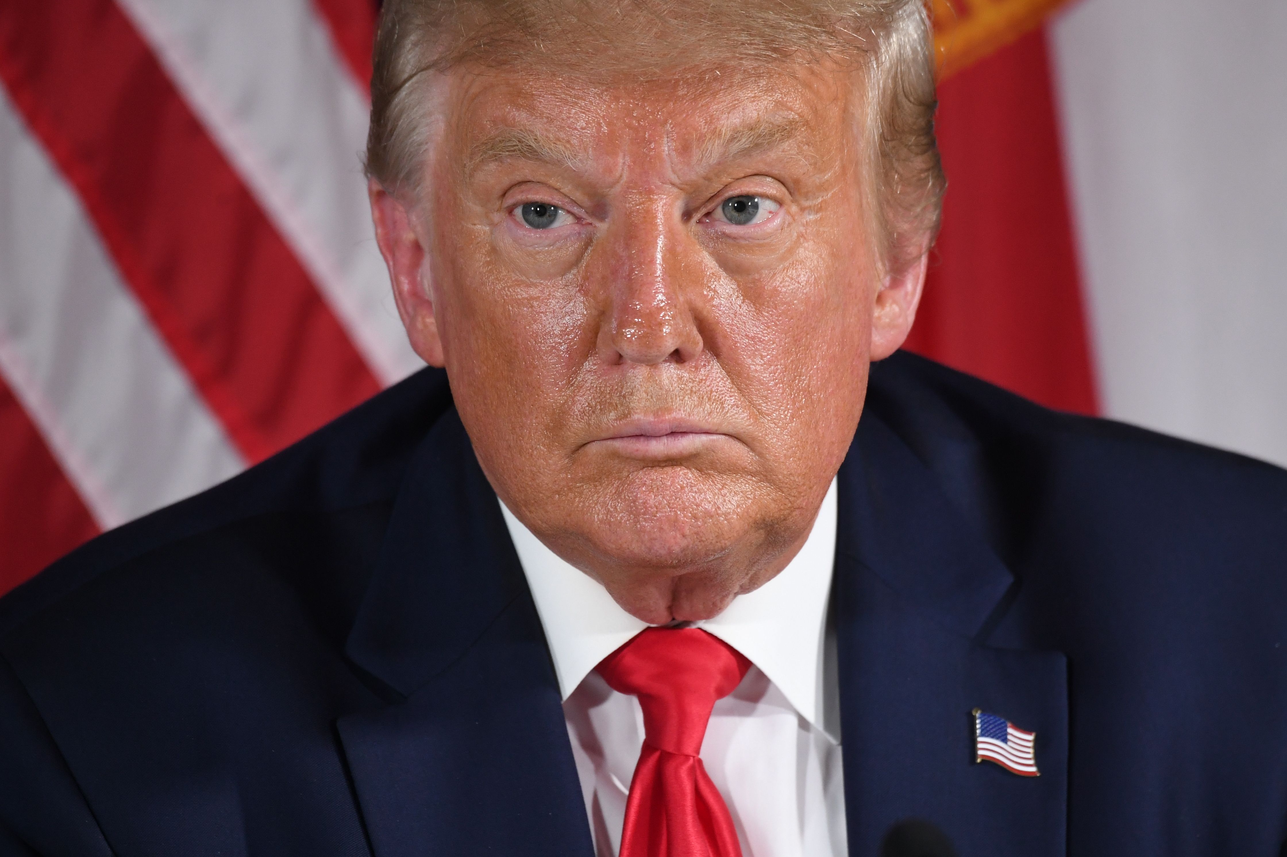 Donald Trump holds a COVID-19 and storm preparedness roundtable in Belleair, Florida on July 31, 2020. (SAUL LOEB/AFP via Getty Images)