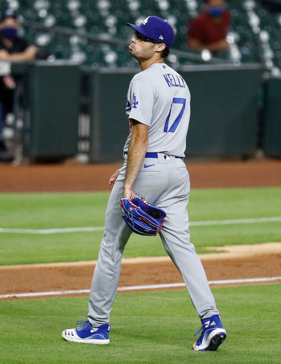 Joe Kelly of the Los Angeles Dodgers reacts after a series of high inside pitches to Carlos Correa of the Houston Astros in the sixth inning at Minute Maid Park on July 28, 2020 in Houston, Texas. Both benches emptied after words were exchanged. (Bob Levey/Getty Images)