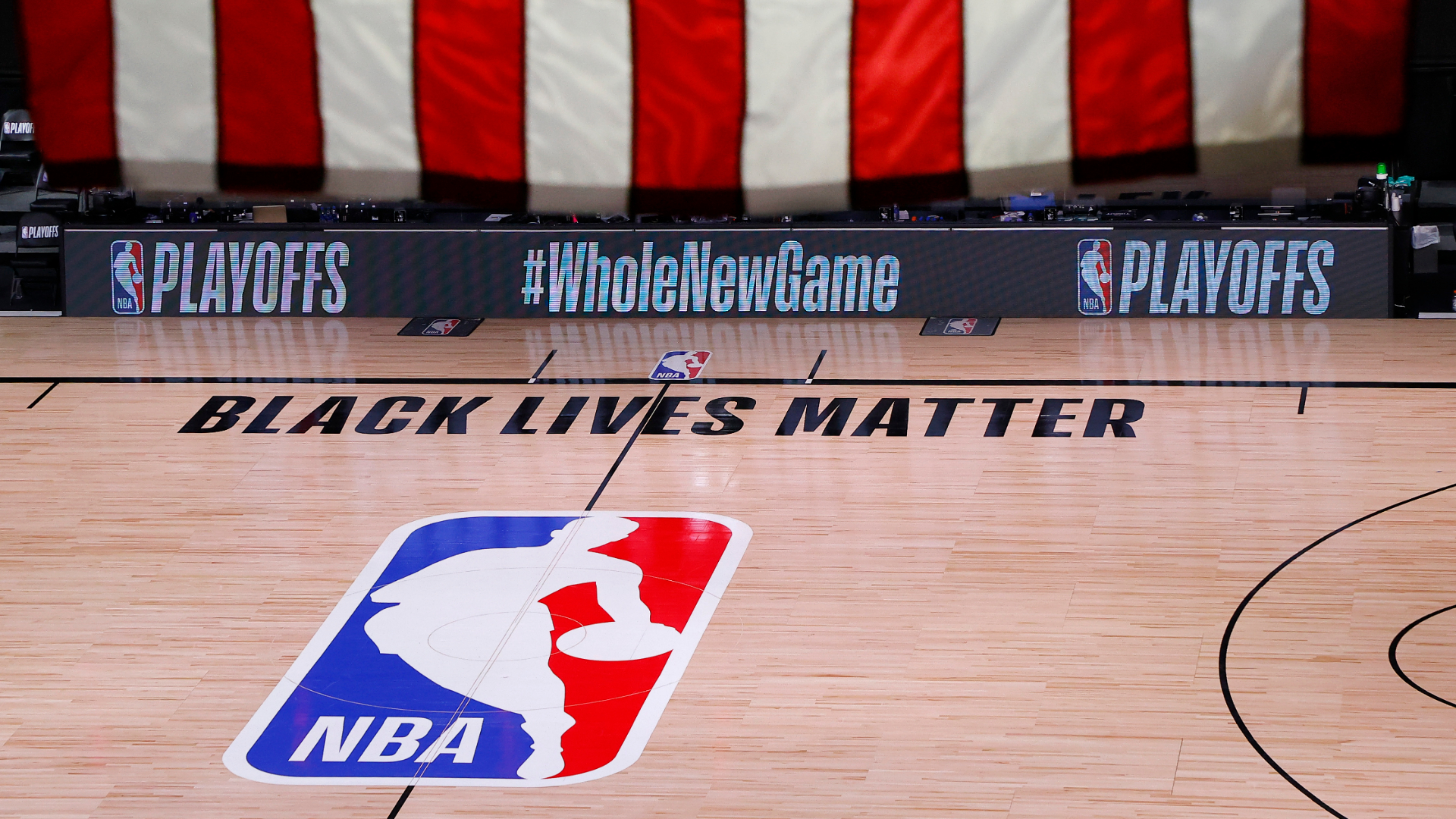 An empty court and bench is shown following the scheduled start time in Game Five of the Eastern Conference First Round between the Milwaukee Bucks and the Orlando Magic during the 2020 NBA Playoffs at AdventHealth Arena in Lake Buena Vista, Florida, on Aug. 26, 2020. (Kevin C. Cox/Getty Images)