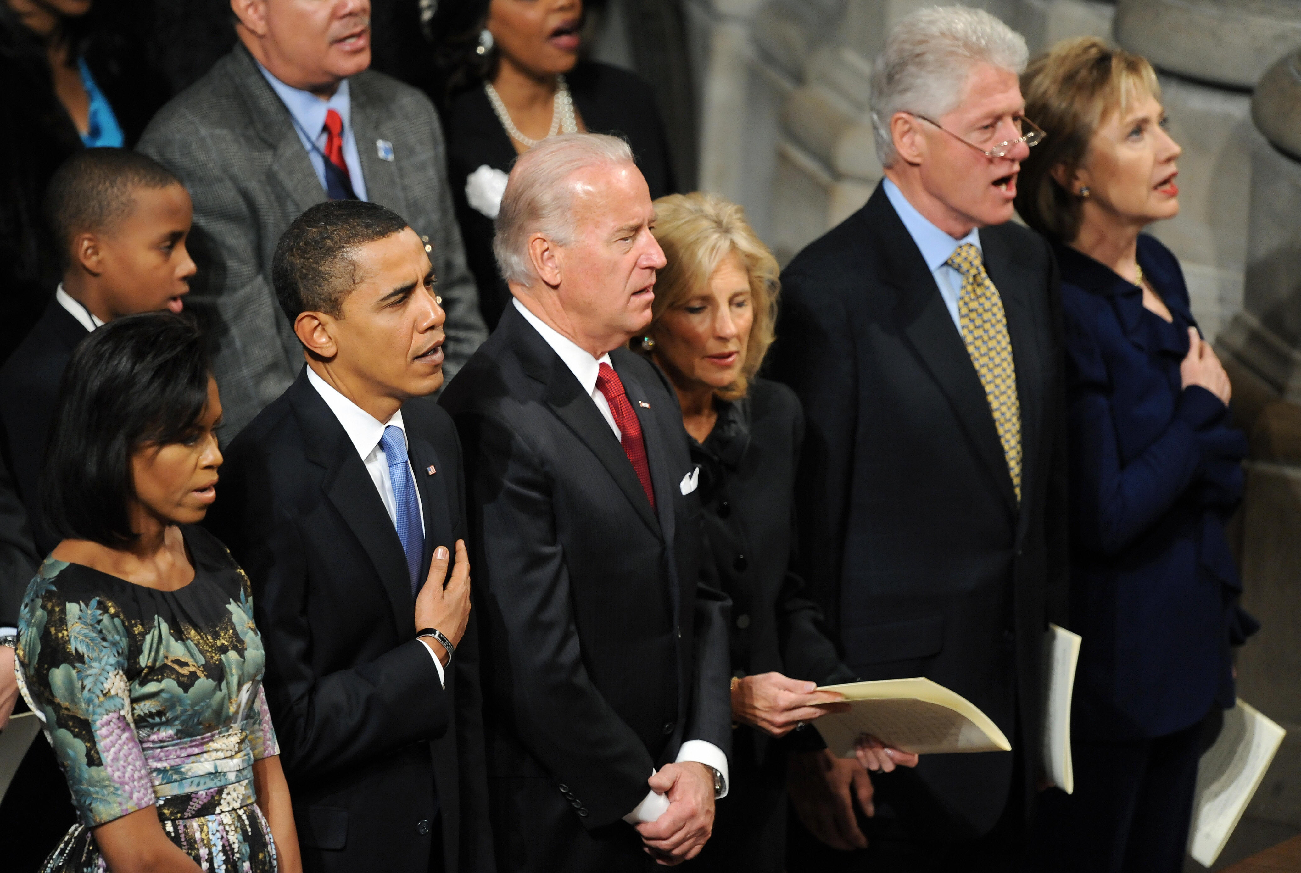 Barack and Michella Obama, Joe and Jill Biden, and Bill and Hillary Rodham Clinton attend the National Prayer Service in Washington, D.C., on Jan. 21, 2009. (JEWEL SAMAD/AFP via Getty Images)