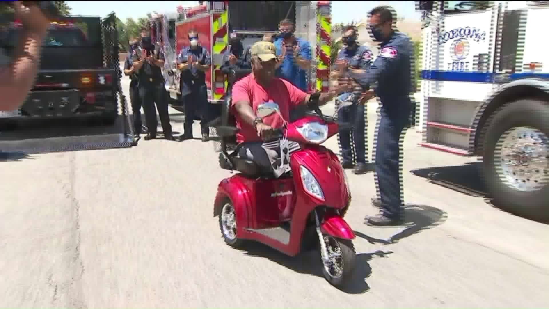 Horace Jackson receives his new electric scooter on Aug. 6, 2020. (KTLA)