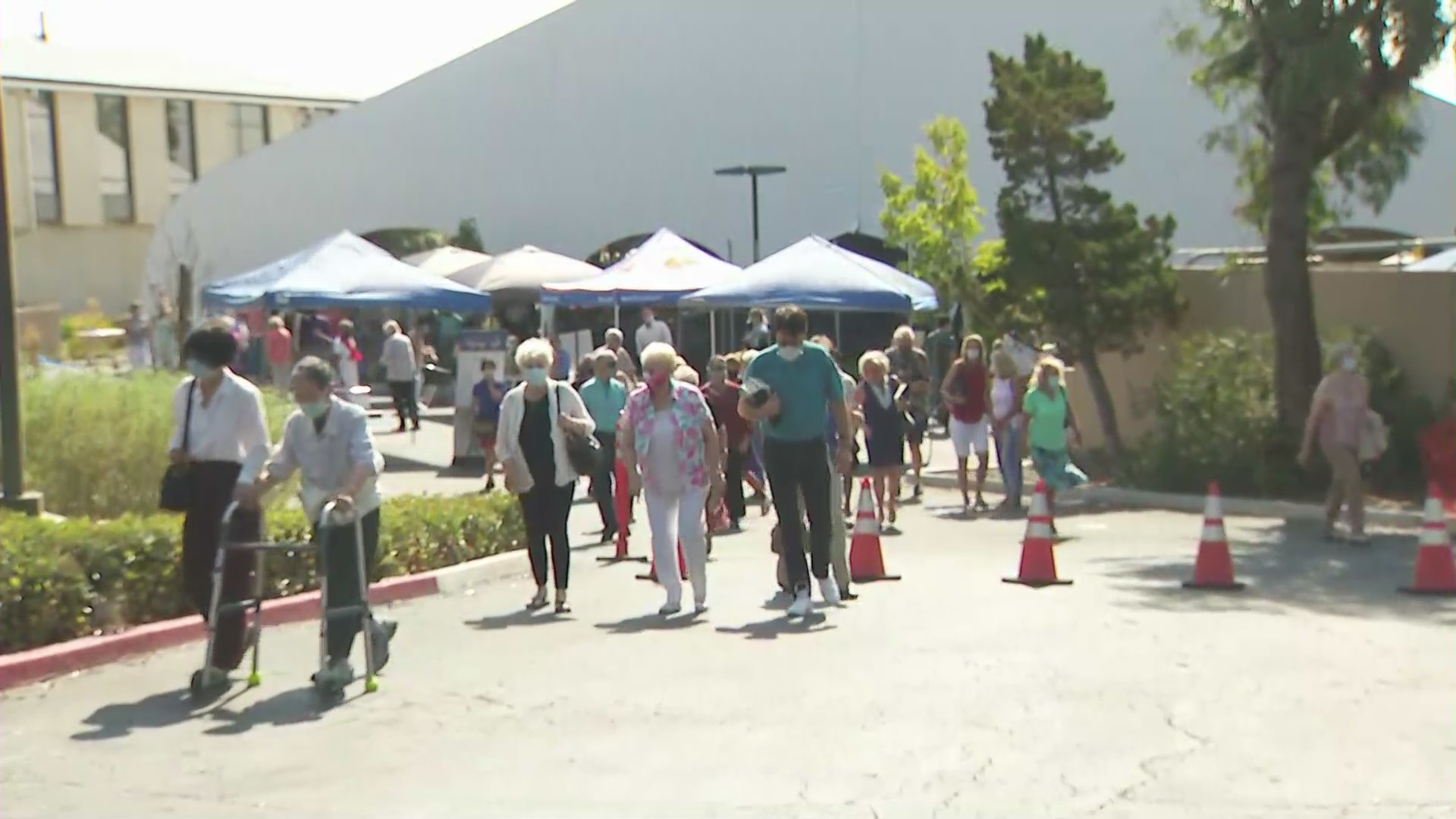 Churchgoers leave after an outdoor service at Rolling Hills Covenant Church in Rolling Hills Estates on Aug. 16, 2020. (KTLA)