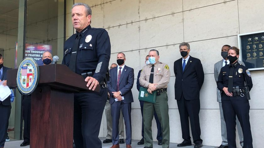 Police Chief Michel Moore joins other law enforcement officials outside LAPD headquarters on Aug. 26, 2020, to announce arrests stemming from mass protests of police brutality. (Kevin Rector / Los Angeles Times)