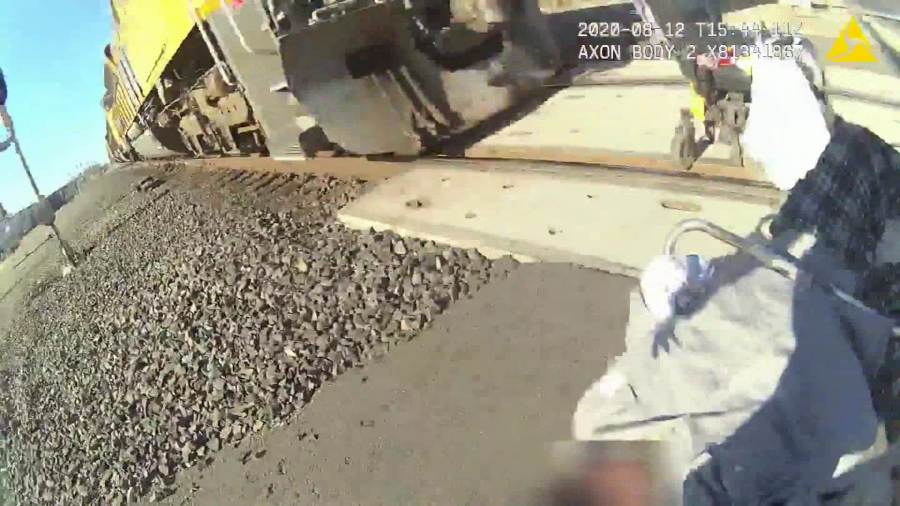 Officer Erica Urrea spotted a man in a wheelchair who appeared to be stuck on train tracks, according to a news release from her department in Lodi, near Sacramento. (Lodi Police Department)