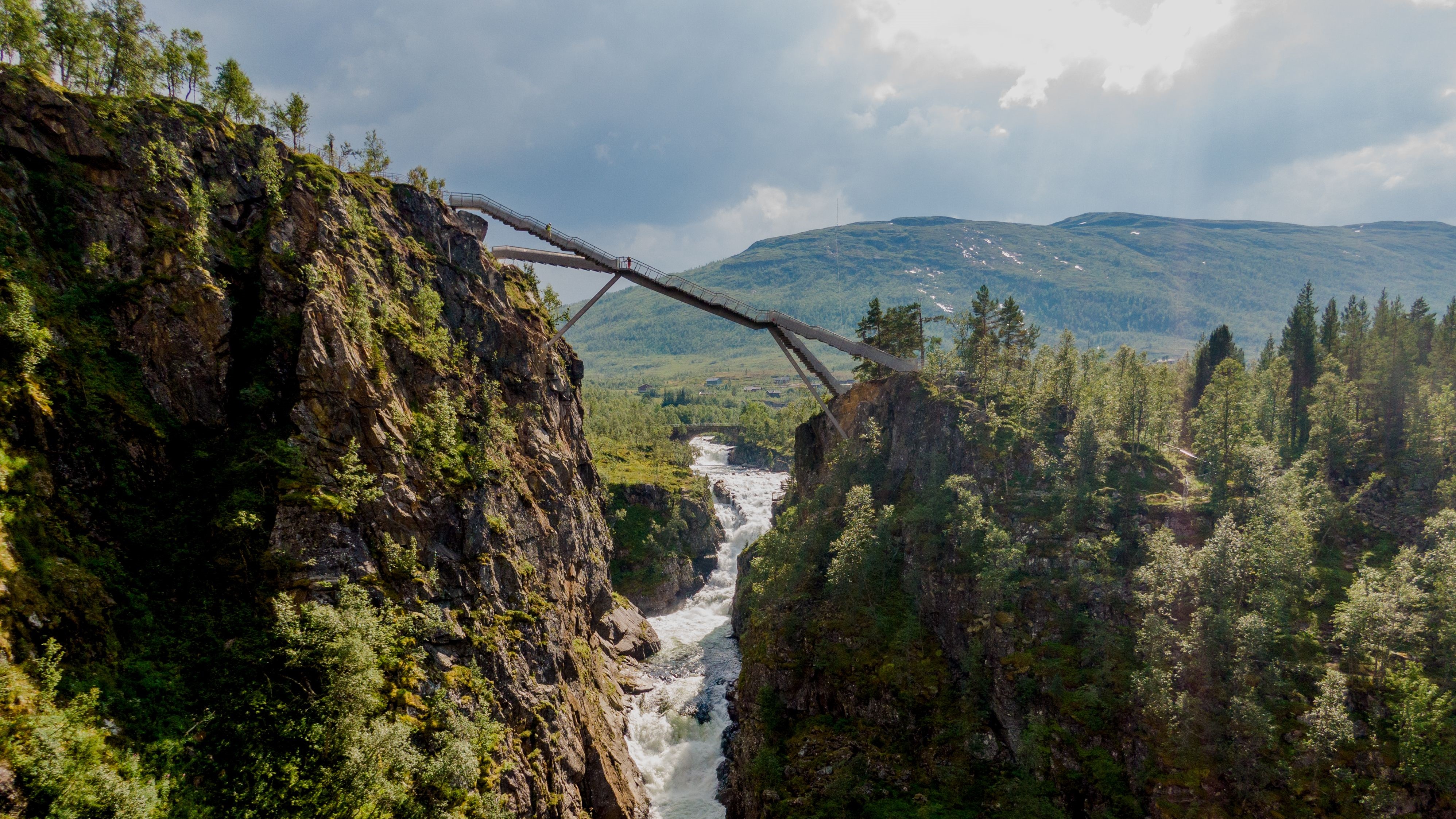 The Vøringsfossen waterfall bridge is a newly opened tourist attraction offering incredible views of the spectacular landscape near Eifjord in Hardanger, western Norway. (STIAN LYSBERG SOLUM/NTB Scanpix/AFP via Getty Images)