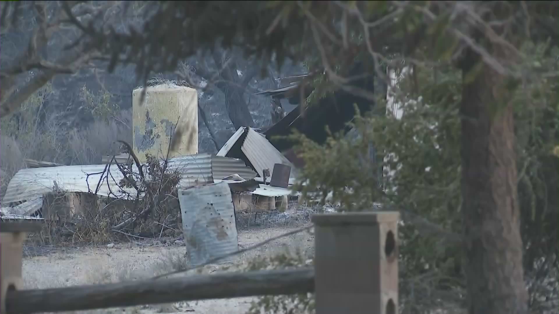 A home is damaged in the Lake Fire, which erupted in the Angeles National Forest on Aug. 12, 2020. (KTLA)