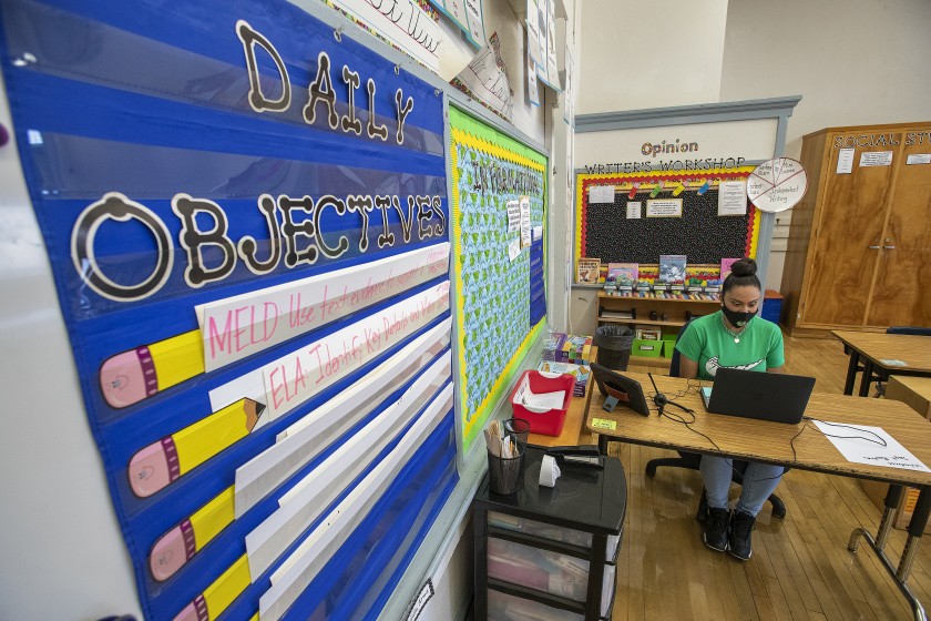 Gladys Alvarez, a fifth grade teacher at Manchester Avenue Elementary School in South Los Angeles, talks to her students via Zoom during a meet-and-greet on Aug.19, 2020. (Mel Melcon/Los Angeles Times)