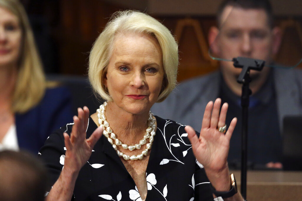 In this Jan. 13, 2020, file photo, Cindy McCain, wife of former Arizona Sen. John McCain, waves to the crowd after being acknowledged by Arizona Republican Gov. Doug Ducey during his State of the State address on the opening day of the legislative session at the Capitol in Phoenix. (Ross D. Franklin/Associated Press)