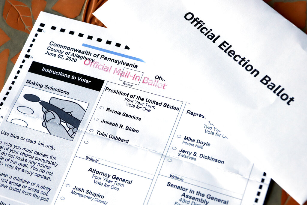 This May 26, 2020, photo shows a mail-in ballot and secrecy envelope for the Pennsylvania primary in Pittsburgh. (Gene J. Puskar / Associated Press)