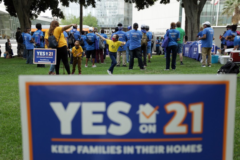 A “Celebrate Renters Rally” in support of Proposition 21, a statewide rent control ballot measure, is held at Los Angeles City Hall. (Myung J. Chun / Los Angeles Times)