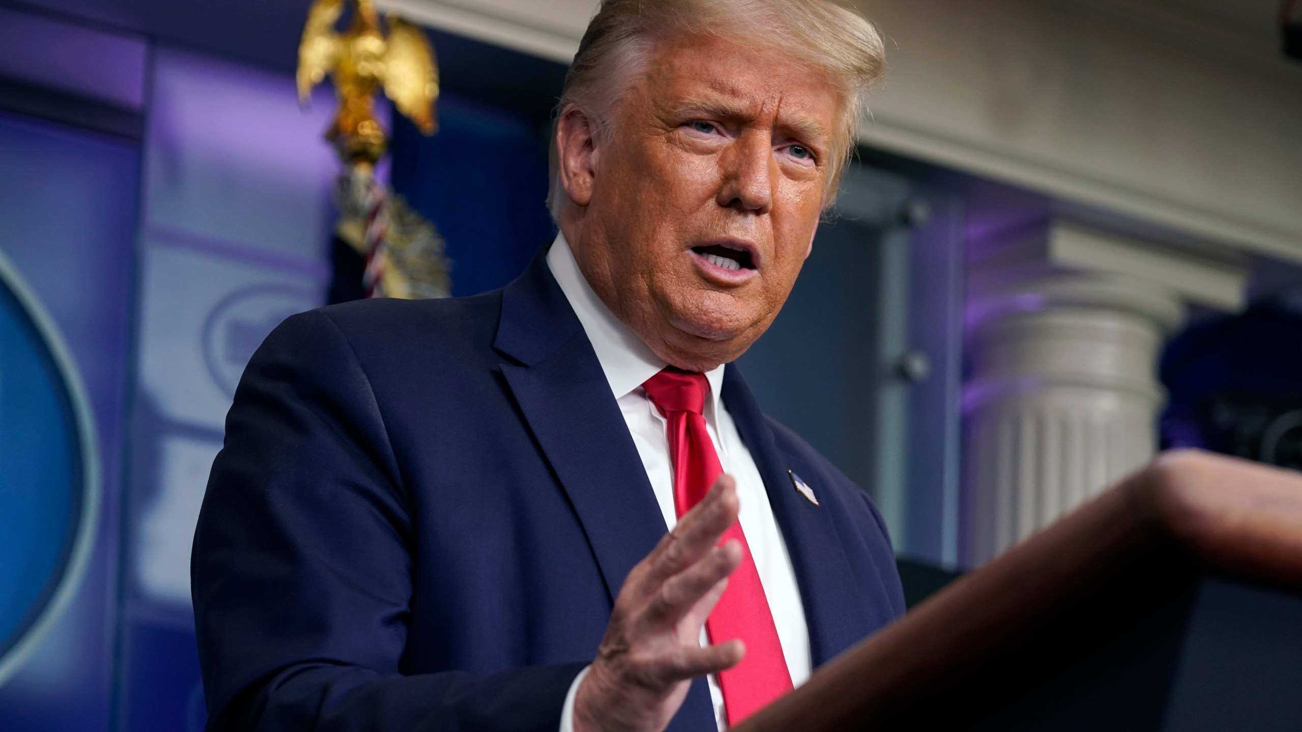 President Donald Trump speaks during a news conference at the White House, Tuesday, July 28, 2020, in Washington. (AP Photo/Evan Vucci)