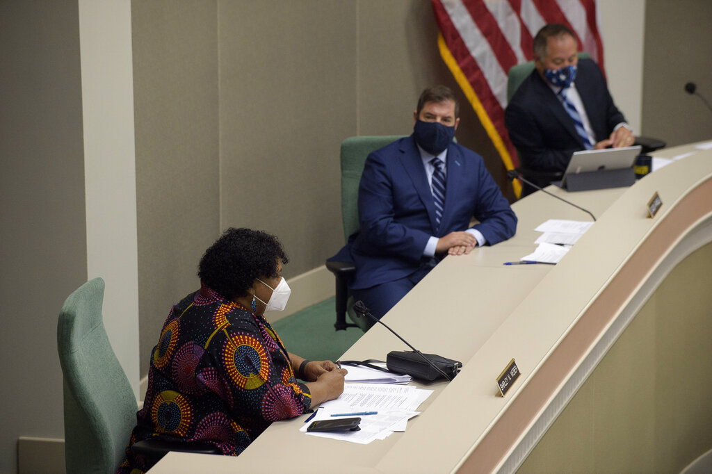 California Assembly member Shirley Weber, D-San Diego, left, speaks during an Assembly Budget Subcommittee hearing on Budget Process, Oversight and Program Evaluation at the Capitol in Sacramento, Calif., Tuesday, Aug. 25, 2020. (AP Photo/Randall Benton)