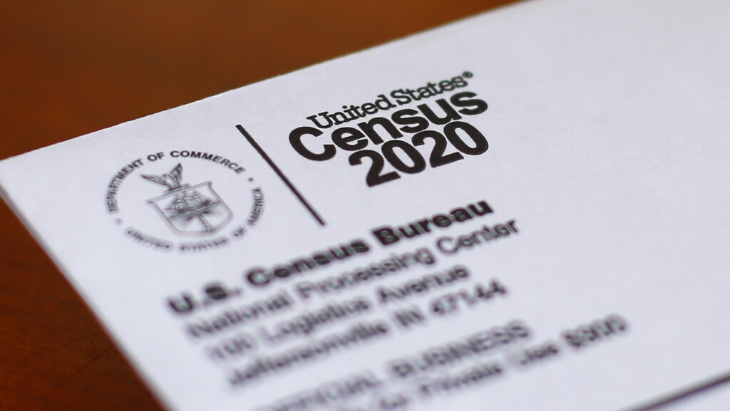 This Sunday, April 5, 2020, photo shows an envelope containing a 2020 census letter mailed to a U.S. resident in Detroit. (AP Photo/Paul Sancya, File)