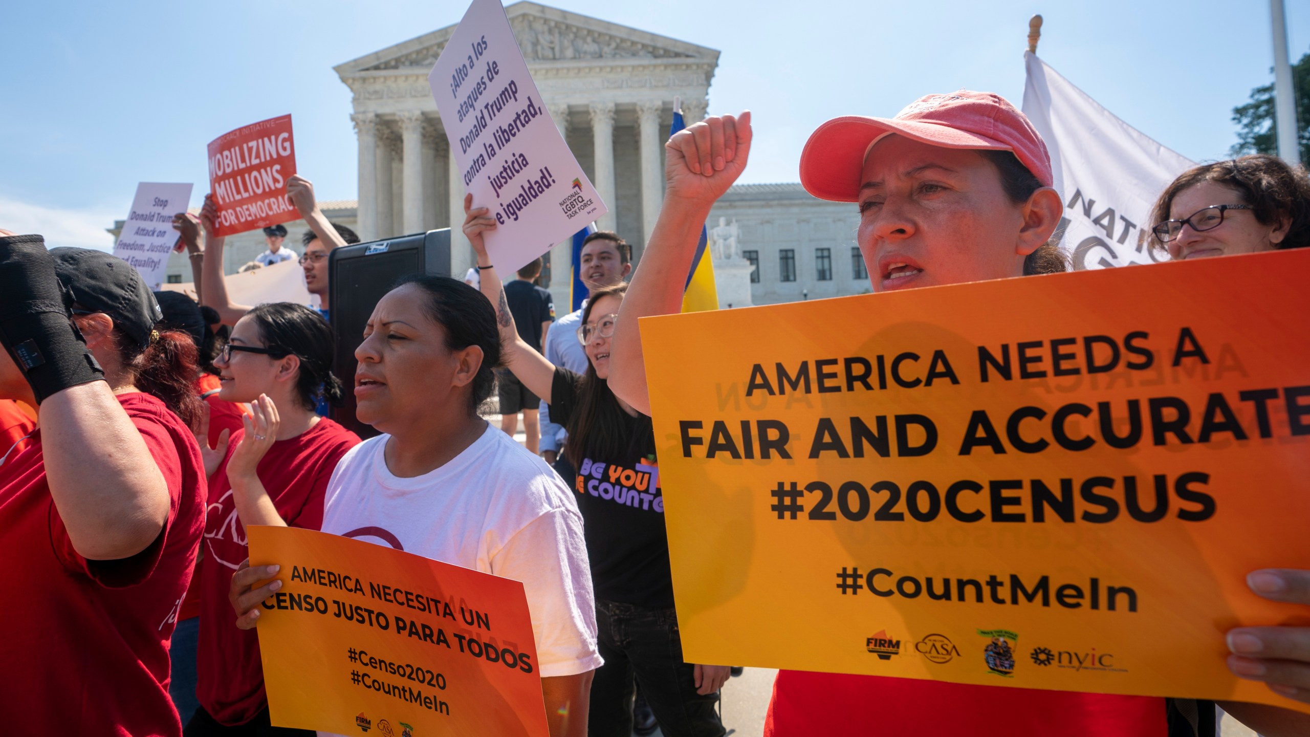 Demonstrators gather at the Supreme Court as the justices finish the term with key decisions on gerrymandering and a census case involving an attempt by the Trump administration to ask everyone about their citizenship status in the 2020 census, on June 27, 2019. (J. Scott Applewhite / Associated Press)