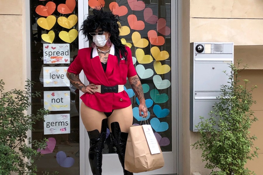 This Aug. 28, 2020 photo shows Kochina Rude delivering food for customers in San Francisco. (AP Photo/Haven Daley)