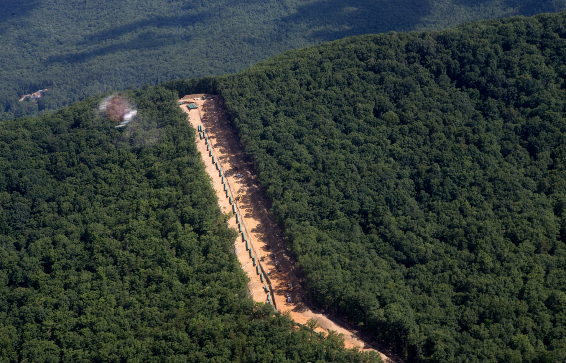 This July 18, 2018, file photo, shows the Mountain Valley Pipeline route on Brush Mountain in Virginia. The Trump administration is seeking to fast track environmental reviews of the pipeline and dozens of other energy, highway and other infrastructure projects across the U.S. (Heather Rousseau/The Roanoke Times via AP, File)