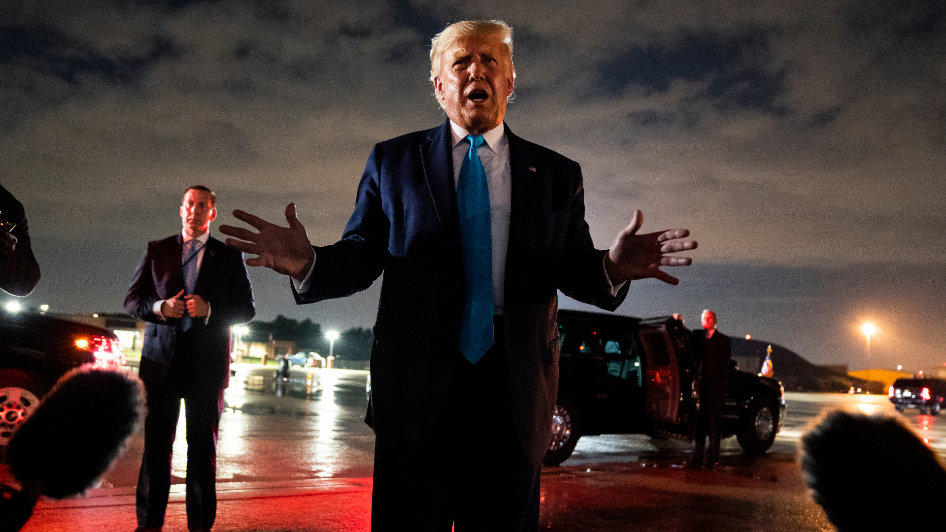 President Donald Trump talks with reporters at Andrews Air Force Base in Maryland after attending a campaign rally in Latrobe, Pennsylvania, on Sept. 3, 2020. (Evan Vucci / Associated Press)