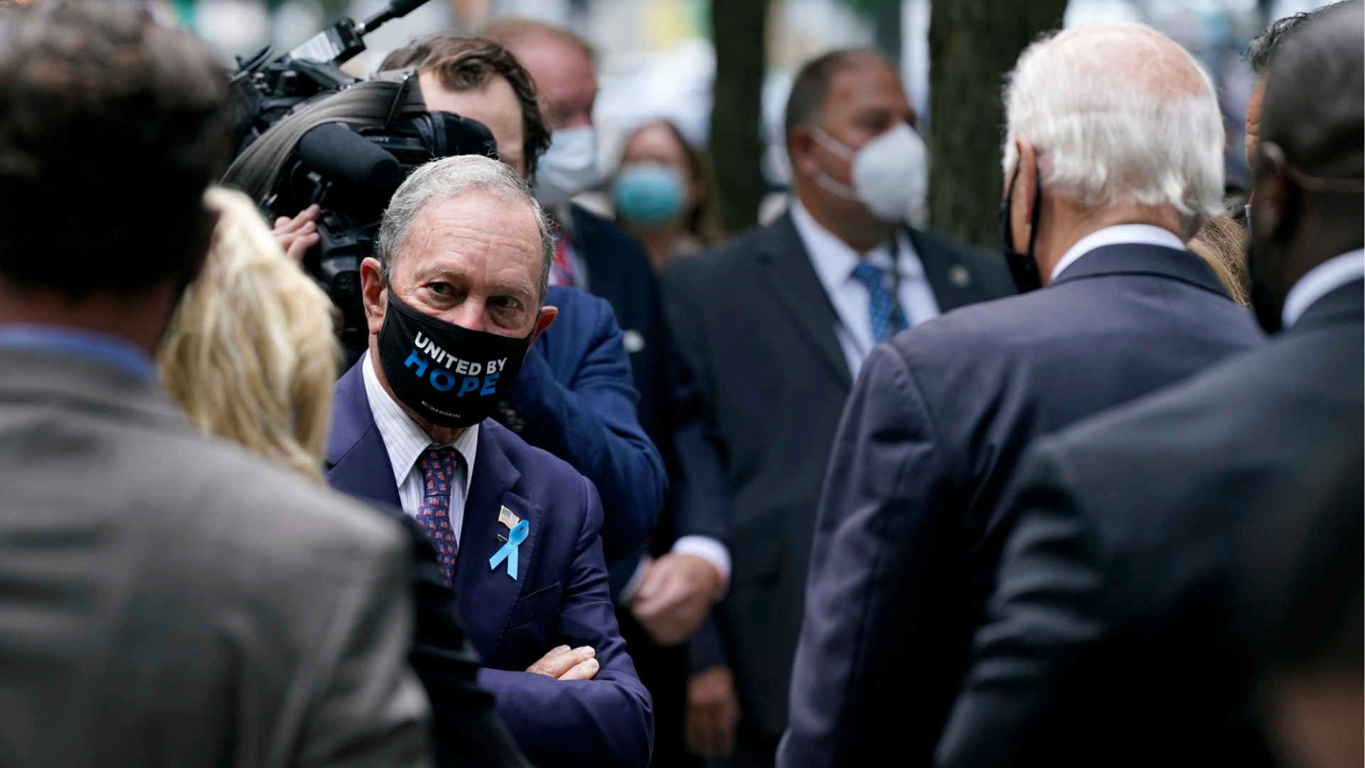 Former New York Mayor Michael Bloomberg, left, visits with Democratic presidential candidate and former Vice President Joe Biden at the National September 11 Memorial in New York on Sept. 11, 2020, before a ceremony marking the 19th anniversary of the Sept. 11 terrorist attacks. (AP Photo/Patrick Semansky)