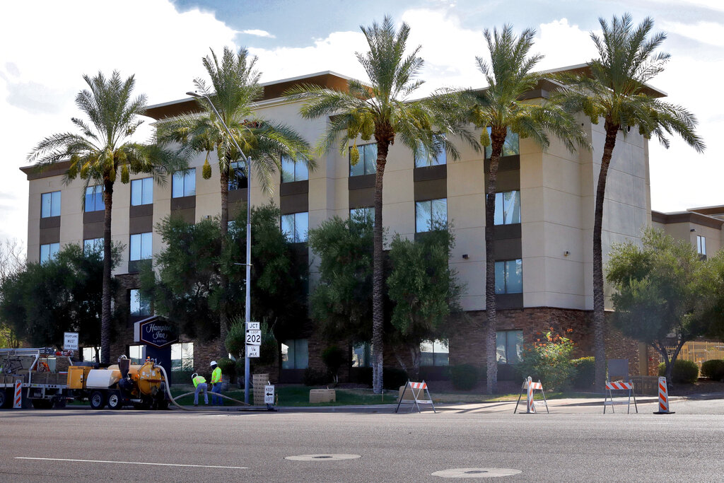 In this July 21, 2020, file photo, a Hampton Inn is shown in Phoenix. (AP Photo/Matt York, File)