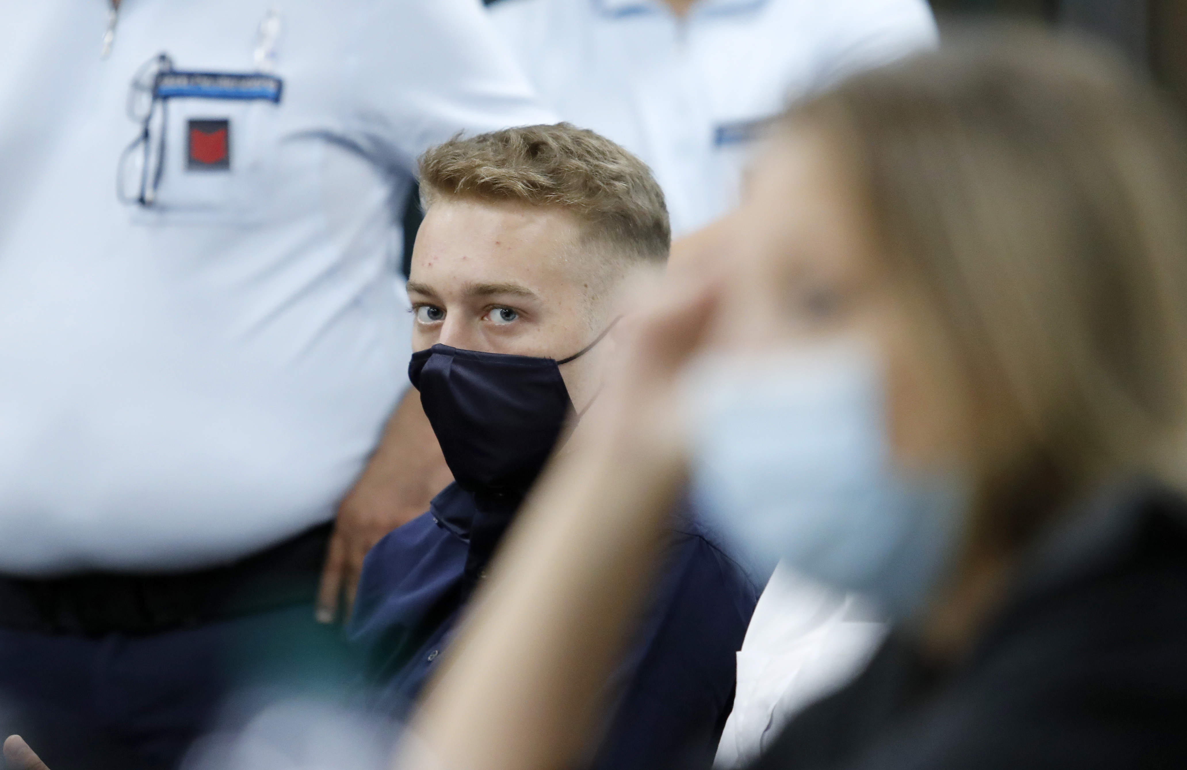 Finnegan Lee Elder, from San Francisco, looks on during a break in his trial where he and his friend Gabriel Natale-Hjorth are accused of slaying a plainclothes Carabinieri officer while on vacation in Italy last summer, in Rome, Wednesday, Sept. 16, 2020. (Remo Casilli/Pool Photo via AP)