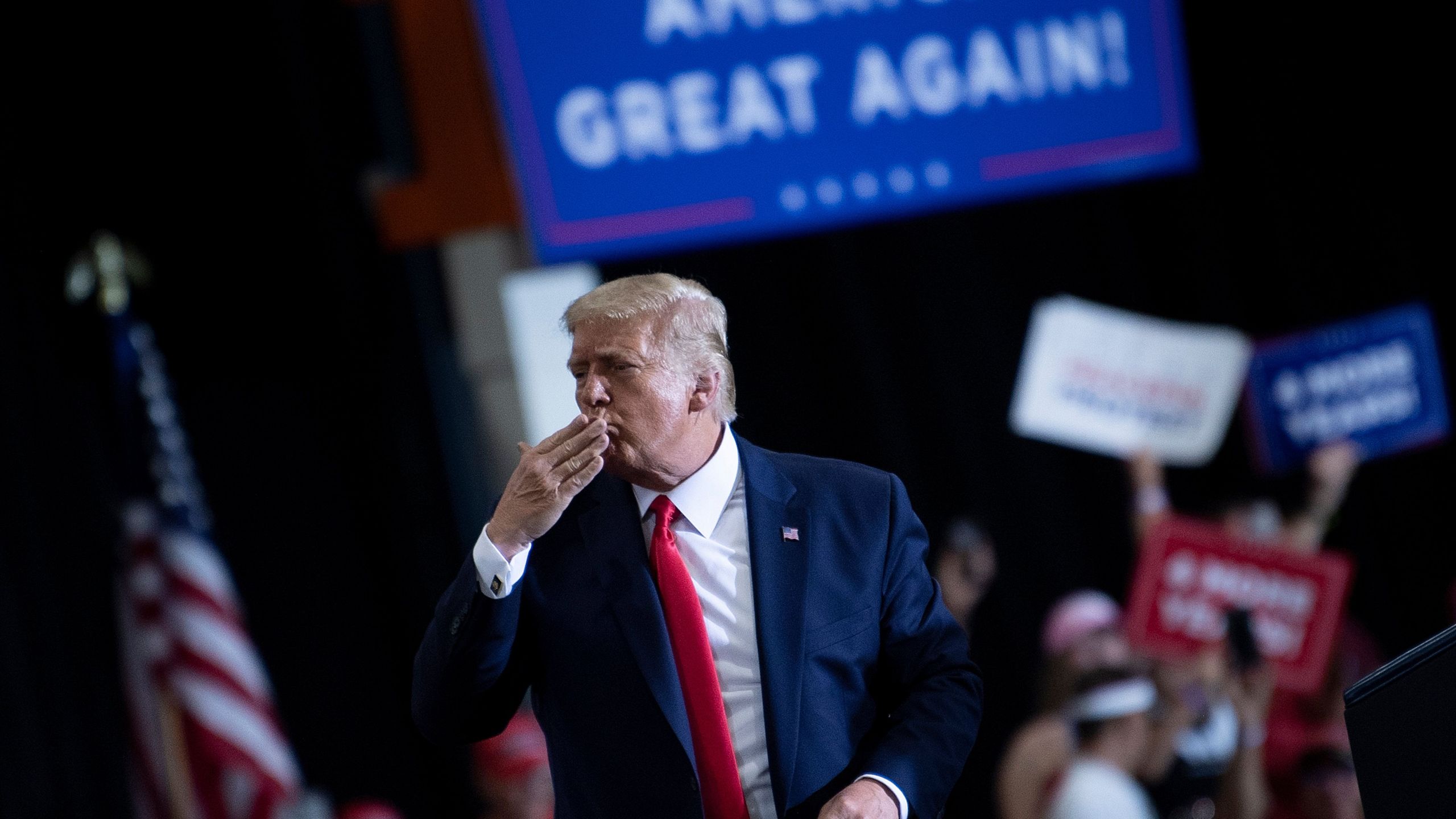 U.S. President Donald Trump blows a kiss to supporters after speaking during an indoor campaign rally at Xtreme Manufacturing in Henderson, a suburb of Las Vegas, Nevada, on Sep. 13, 2020. (Brendan Smialowski / AFP via Getty Images)