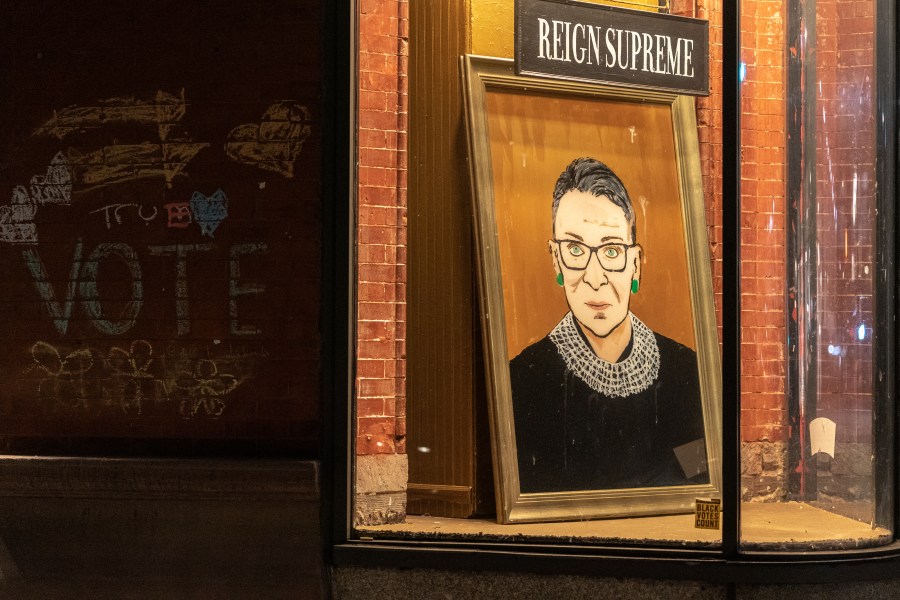 A portrait of Supreme Court Justice Ruth Bader Ginsburg is displayed at a storefront on Sept. 19, 2020 in New York, New York. (Jeenah Moon/Getty Images)