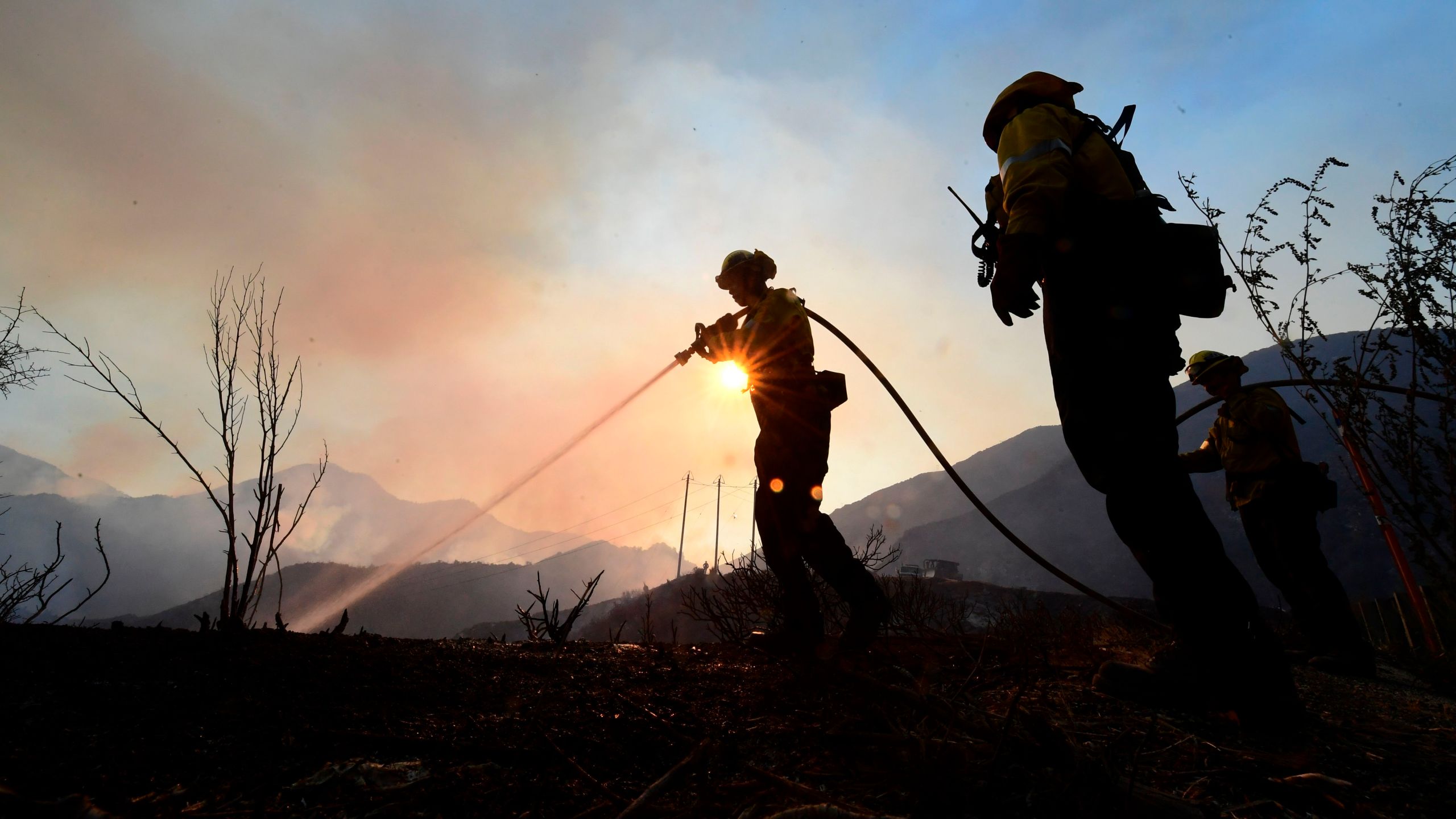 Firefighters work the Bobcat Fire in the Angeles National Forest on Sept. 23, 2020, in Los Angeles. (FREDERIC J. BROWN/AFP via Getty Images)